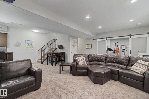 3433 West Landing Landing, Edmonton, AB - Indoor Photo Showing Living Room