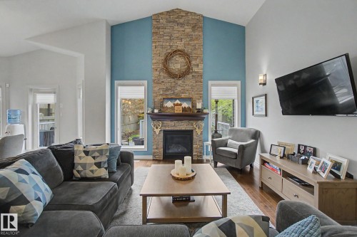 3433 West Landing Landing, Edmonton, AB - Indoor Photo Showing Living Room With Fireplace