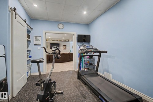 3433 West Landing Landing, Edmonton, AB - Indoor Photo Showing Gym Room