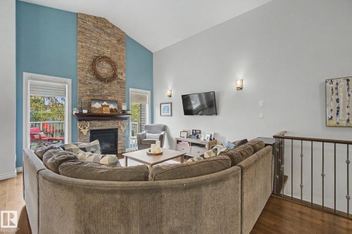 3433 West Landing Landing, Edmonton, AB - Indoor Photo Showing Living Room With Fireplace