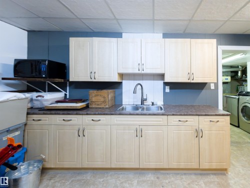7323 147 Avenue, Edmonton, AB - Indoor Photo Showing Kitchen With Double Sink