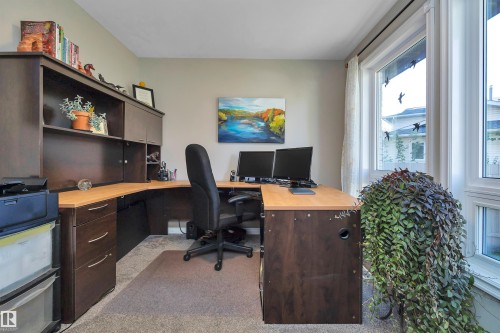 Front den also has a closet which could be a 4th bedroom on the main floor. - 14 Ash Place, St. Albert, AB - Indoor Photo Showing Office