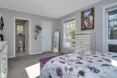 Walk in Closet & 3pce renovated ensuite - 14 Ash Place, St. Albert, AB - Indoor Photo Showing Bedroom