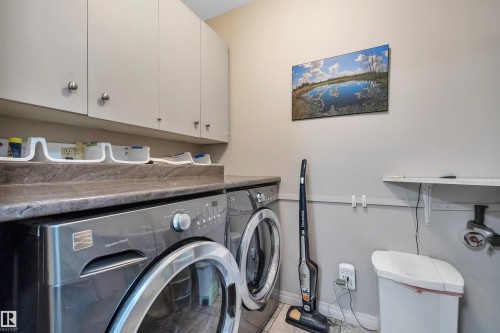 Main floor laundry room. Washer Dryer new 2025 - 14 Ash Place, St. Albert, AB - Indoor Photo Showing Laundry Room