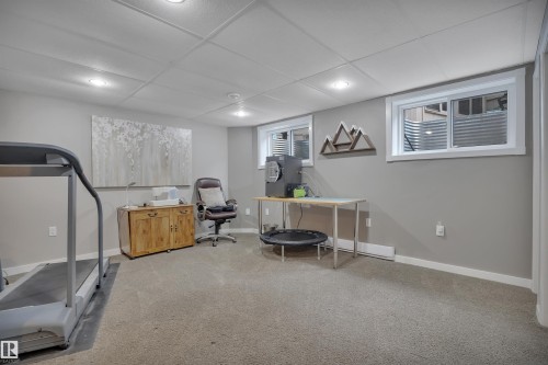 Basement window's replaced in 2024. 4 window's enlarged for brighter benefits along with deeper window wells. NOTE: With one added wall and door this area could be another basement bedroom for two nice size bedroom's and still lots of Rec rm space. - 14 Ash Place, St. Albert, AB - Indoor