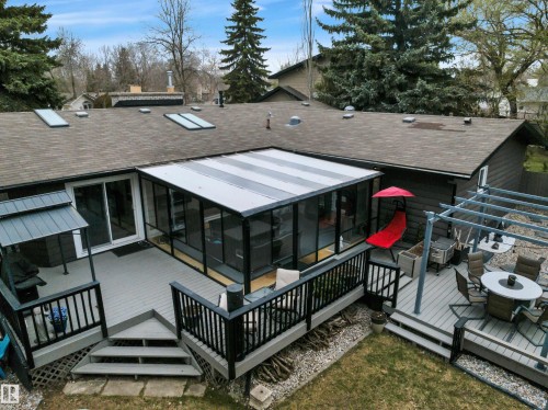 Extensive deck & Visiting/Entertaining areas to follow the sun or shade. Gorgeous Sun room with light filtering ceiling panels. 2024 - 14 Ash Place, St. Albert, AB - Outdoor With Deck Patio Veranda With Exterior