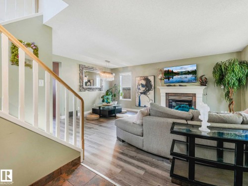 16228 55A Street, Edmonton, AB - Indoor Photo Showing Other Room With Fireplace