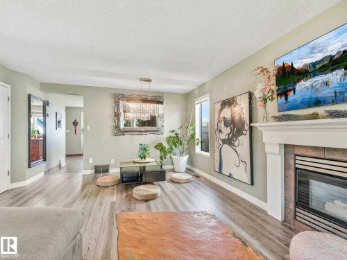 16228 55A Street, Edmonton, AB - Indoor Photo Showing Living Room With Fireplace