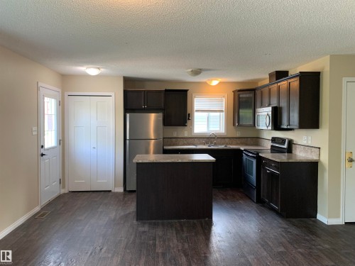 11824 93 Street, Edmonton, AB - Indoor Photo Showing Kitchen With Double Sink