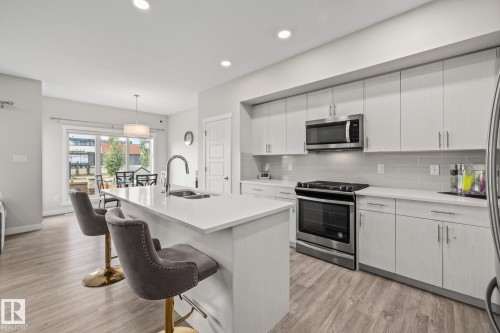 2024 160 Street Sw, Edmonton, AB - Indoor Photo Showing Kitchen With Stainless Steel Kitchen With Double Sink With Upgraded Kitchen