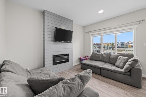 2024 160 Street Sw, Edmonton, AB - Indoor Photo Showing Living Room With Fireplace