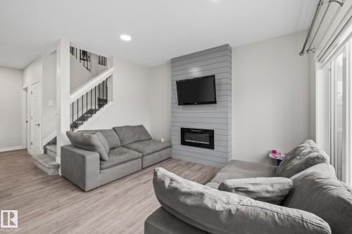 2024 160 Street Sw, Edmonton, AB - Indoor Photo Showing Living Room With Fireplace