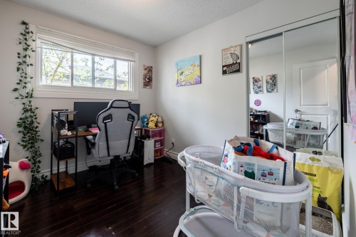 Hardwood-style flooring throughout - 3004 68 Street, Edmonton, AB - Indoor