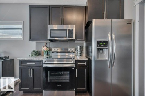 59 Nadine Way, St. Albert, AB - Indoor Photo Showing Kitchen With Stainless Steel Kitchen With Upgraded Kitchen