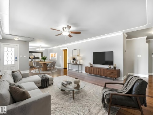 Virtually staged - 5406 46 Avenue, Wetaskiwin, AB - Indoor Photo Showing Living Room