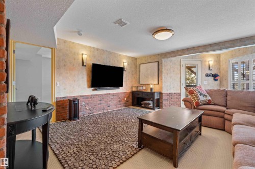 68 Greystone Crescent, Spruce Grove, AB - Indoor Photo Showing Living Room With Fireplace
