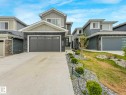Contemporary two-story residence featuring a combination of horizontal siding and stone veneer - 16307 19 Avenue, Edmonton, AB  - Outdoor With Facade 