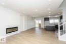 6239 29 Avenue, Edmonton, AB  - Indoor Photo Showing Living Room With Fireplace 