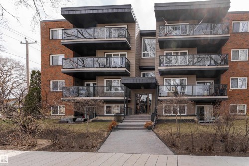 Multi-story residential building featuring a brick and panel facade - 203 10003 87 Avenue, Edmonton, AB - Outdoor With Facade