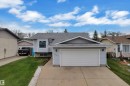 Single-family residence featuring light blue siding and a gray shingle roof - 3227 145 Avenue, Edmonton, AB  - Outdoor 