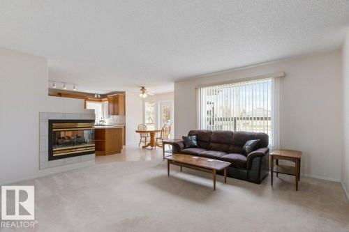 1346 118A Street, Edmonton, AB - Indoor Photo Showing Living Room With Fireplace