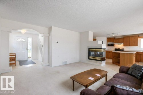 1346 118A Street, Edmonton, AB - Indoor Photo Showing Living Room With Fireplace