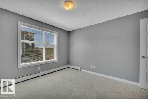 206 5510 Schonsee Drive, Edmonton, AB - Indoor Photo Showing Other Room