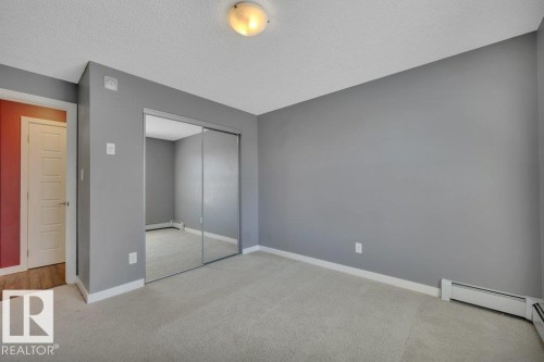 206 5510 Schonsee Drive, Edmonton, AB - Indoor Photo Showing Other Room