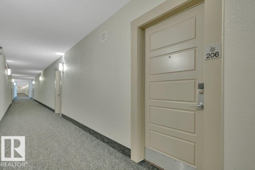 206 5510 Schonsee Drive, Edmonton, AB - Indoor Photo Showing Other Room