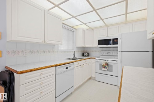 12 9718 176 Street, Edmonton, AB - Indoor Photo Showing Kitchen With Double Sink