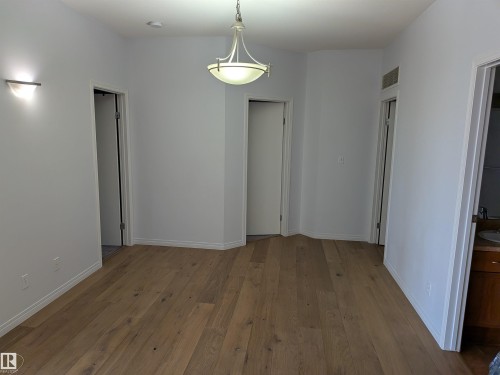 A versatile, spacious dining area suitable for multiple uses. - 419 4304 139 Avenue, Edmonton, AB - Indoor Photo Showing Other Room