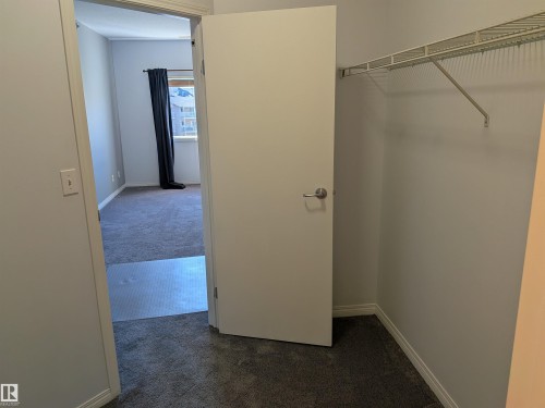 Generously sized ensuite closet with plenty of room for clothing, accessories, and additional storage. - 419 4304 139 Avenue, Edmonton, AB - Indoor