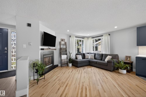 5 Arlington Drive, St. Albert, AB - Indoor Photo Showing Living Room With Fireplace