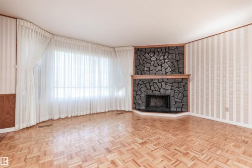 13319 30 Street Nw, Edmonton, AB - Indoor Photo Showing Living Room With Fireplace