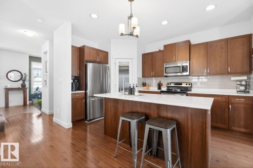 418 Simmonds Way, Leduc, AB - Indoor Photo Showing Kitchen With Upgraded Kitchen