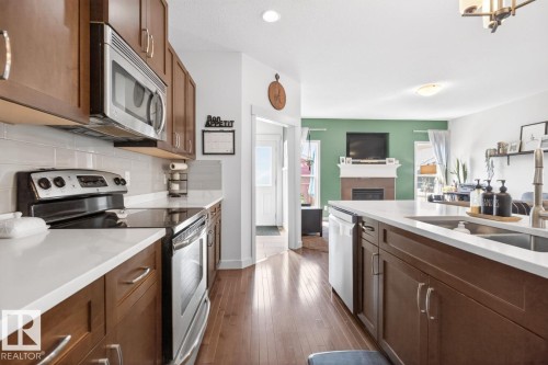 418 Simmonds Way, Leduc, AB - Indoor Photo Showing Kitchen With Double Sink