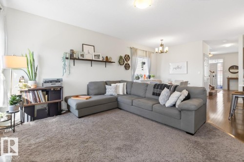 418 Simmonds Way, Leduc, AB - Indoor Photo Showing Living Room