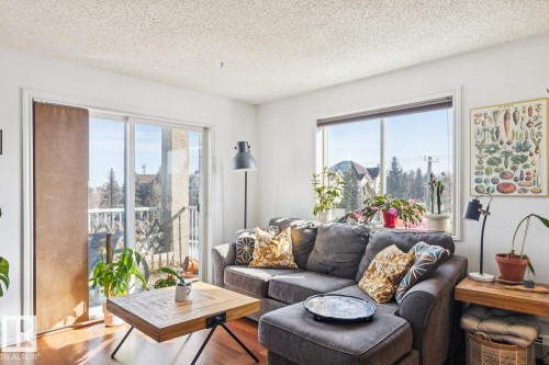 419 10535 122 Street, Edmonton, AB - Indoor Photo Showing Living Room