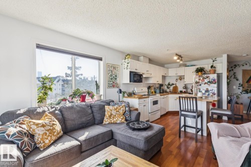 419 10535 122 Street, Edmonton, AB - Indoor Photo Showing Living Room