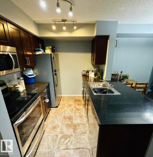122 270 Mcconachie Drive, Edmonton, AB - Indoor Photo Showing Kitchen With Double Sink