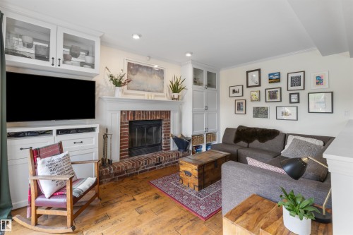 4711 Whitemud Road, Edmonton, AB - Indoor Photo Showing Living Room With Fireplace