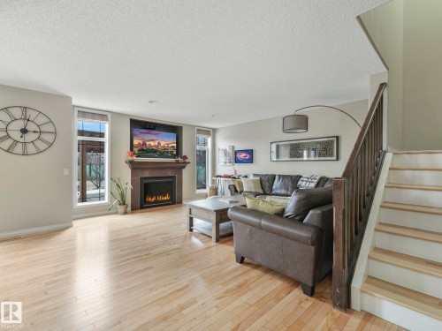 20853 92A Avenue Nw, Edmonton, AB - Indoor Photo Showing Living Room With Fireplace