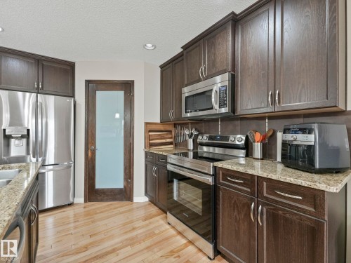 20853 92A Avenue Nw, Edmonton, AB - Indoor Photo Showing Kitchen With Double Sink