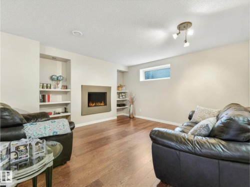 20853 92A Avenue Nw, Edmonton, AB - Indoor Photo Showing Living Room With Fireplace