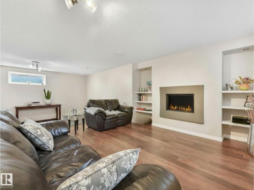 20853 92A Avenue Nw, Edmonton, AB - Indoor Photo Showing Living Room With Fireplace