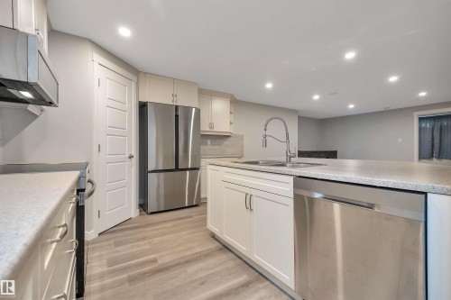 5223 43 Avenue, Leduc, AB - Indoor Photo Showing Kitchen With Double Sink
