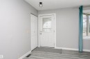 Beautiful new vinyl plank flooring in front entry and throughout main floor. Tile in kitchen and bathrooms. Freshly painted throughout and new lighting. - 11436 161 Avenue, Edmonton, AB  - Indoor Photo Showing Other Room 