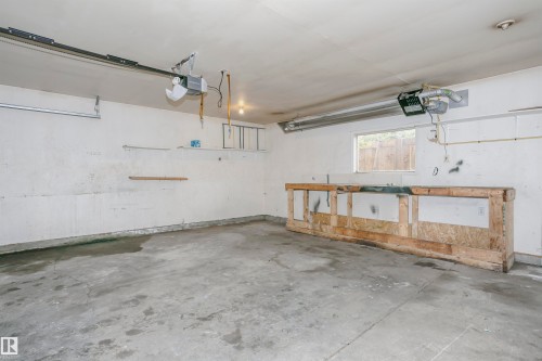 Spacious double detached garage is fully insulated and drywalled with an overhead gas heater. - 11436 161 Avenue, Edmonton, AB - Indoor Photo Showing Garage