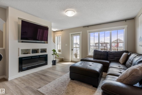 19220 27 Avenue, Edmonton, AB - Indoor Photo Showing Living Room With Fireplace