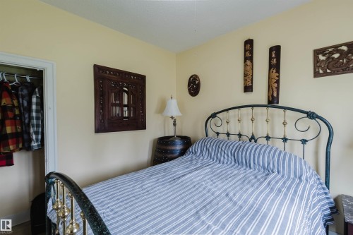 Bedroom featuring light-toned walls and ceiling - 10834 75 Avenue, Edmonton, AB - Indoor Photo Showing Bedroom